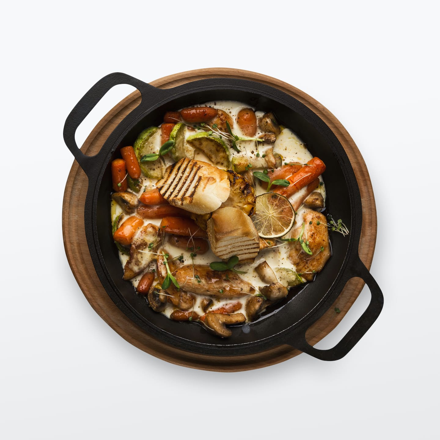 chicken-and-vegetables-stewed-in-pot-isolated-on-w-PXNY5KR